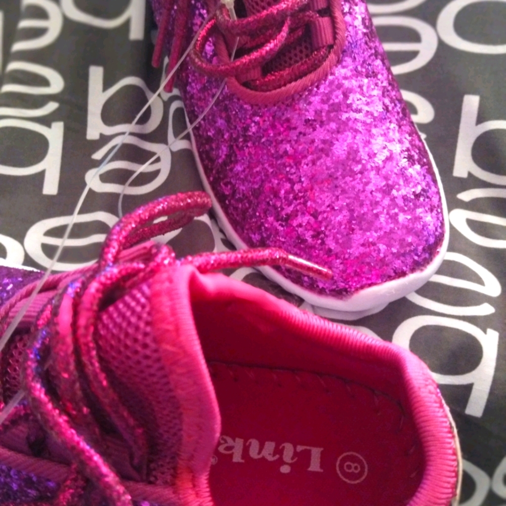 Glitter tie up tennis shoes..